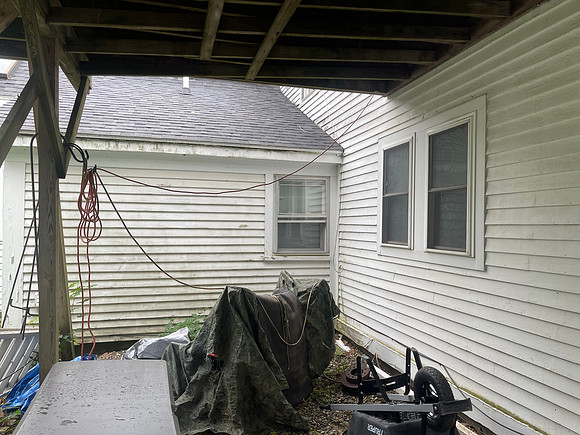 under the deck, bathroom window